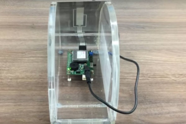 Wujung Hightech&rsquo;s metal-touch solution TOS (Touch on Steel).  Module structure is very simple since piezo film is just attached on the back of a metal plate.